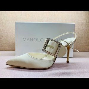champagne satin Manolo Blahnik’s.